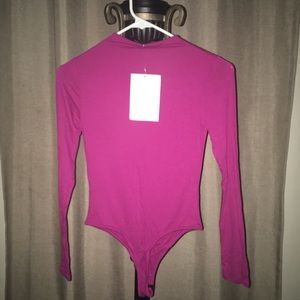 Size: medium, long sleeve, hot pink bodysuit